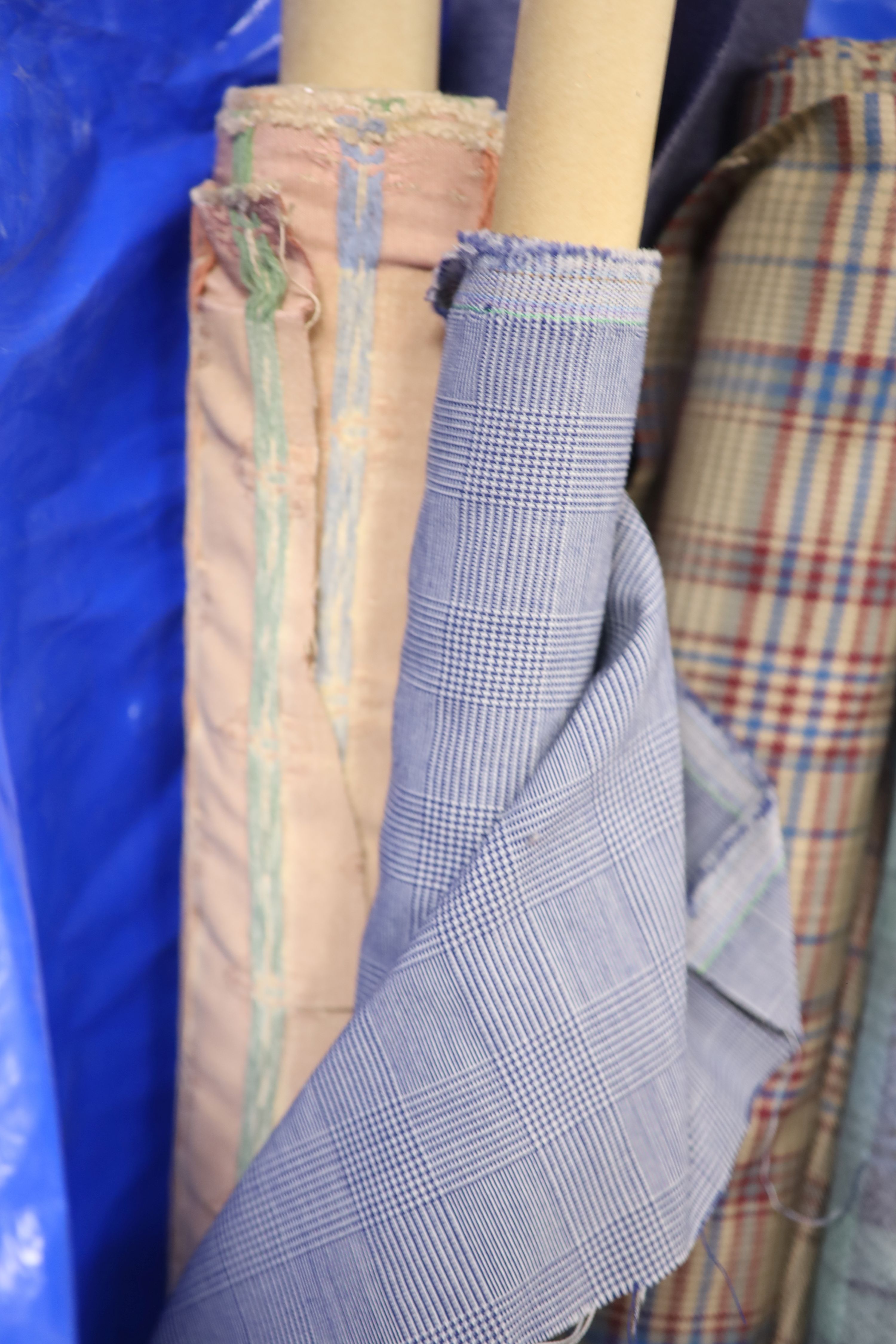 Various lengths of dress fabric including Scottish tartan
